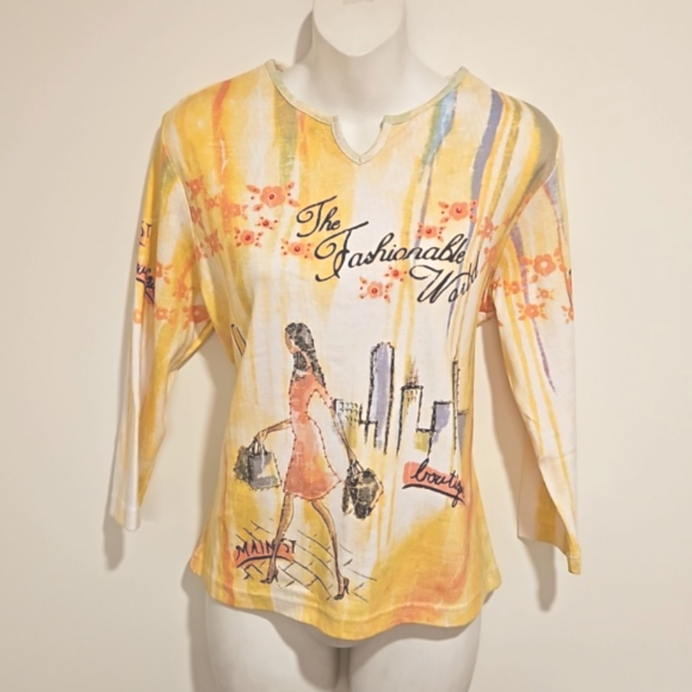 MENCHANT bead embellished chic fashionable woman shopping graphic top Lrg. EUC